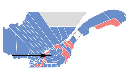 Carte montrant par une flèche le district de Drummond-Arthabaskase se trouvant sur la rive-sud du fleuve Saint-Laurent à l'intérieur des terres et approximativement en face de trois rivière et au Nord de Sherbrooke.